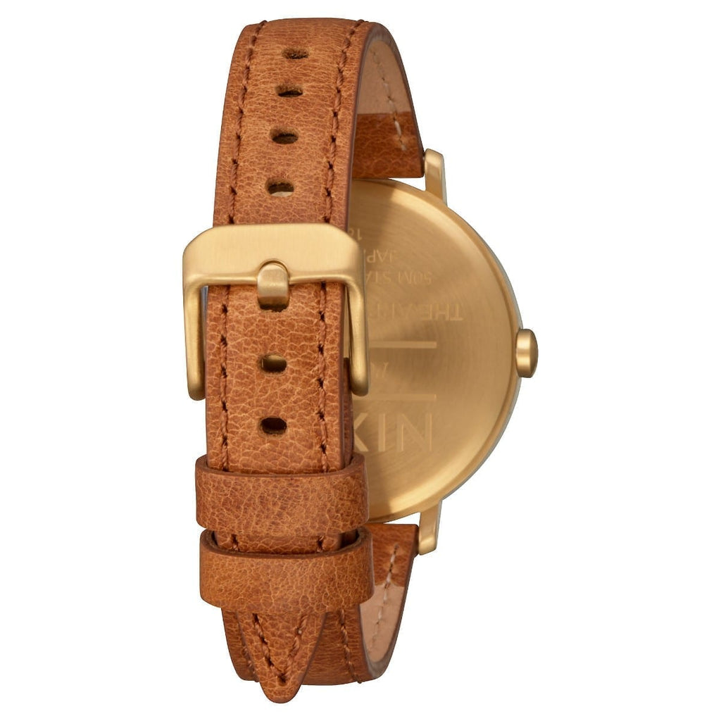 Reloj Nixon Arrow Leather Gold White Saddle