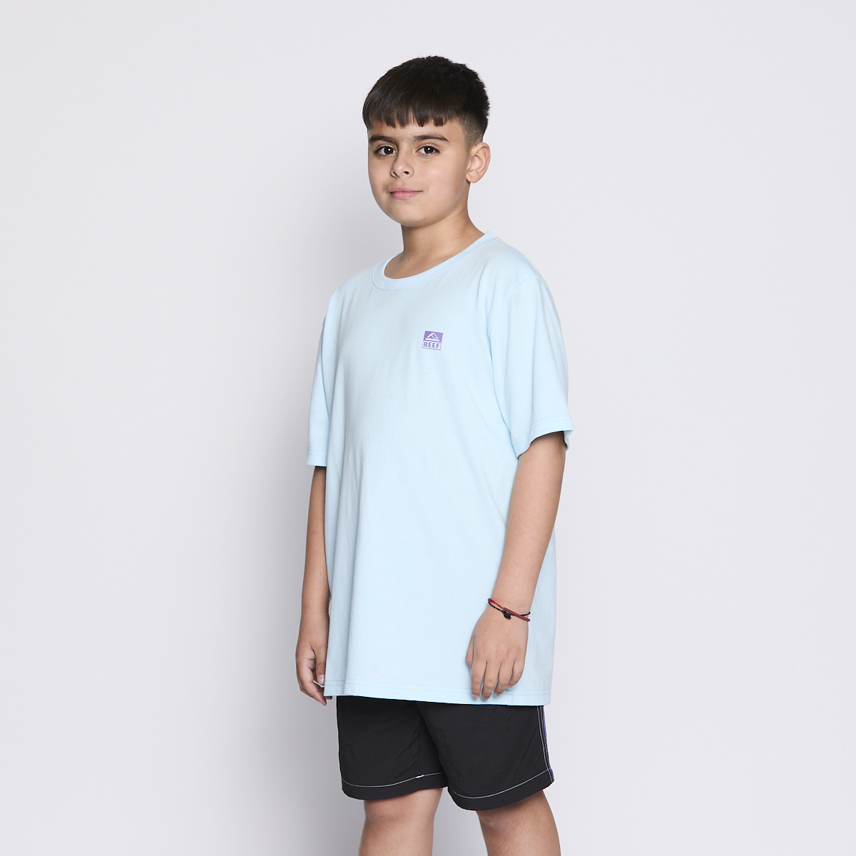 Polera Reef Kids Light Blue Logo Back
