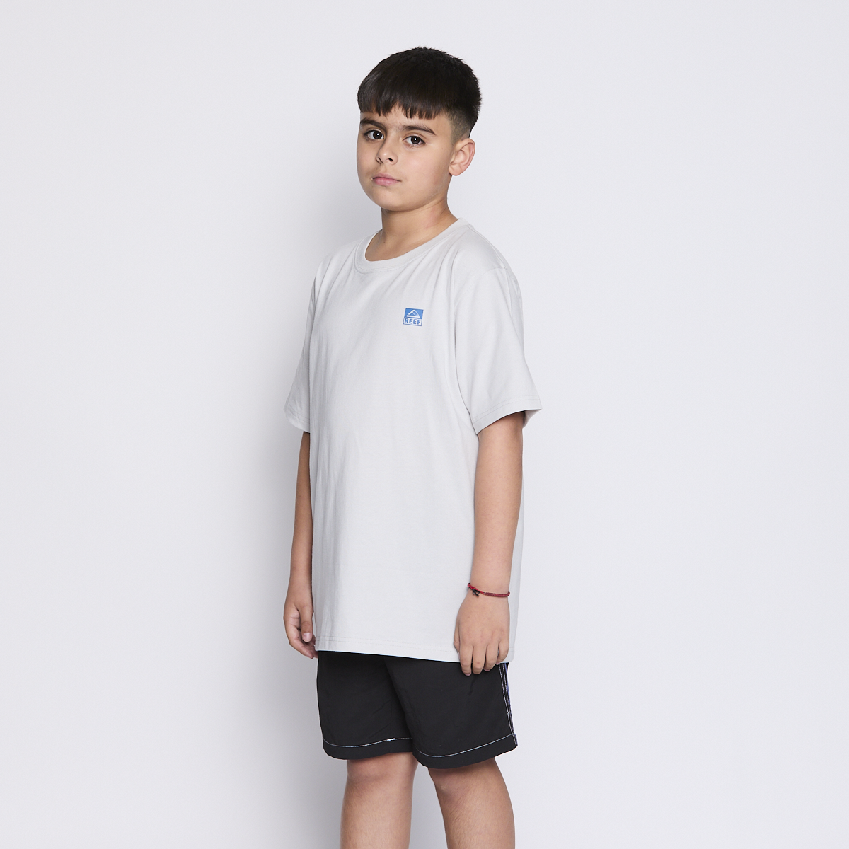 Polera Reef Kids Light Grey Logo Back